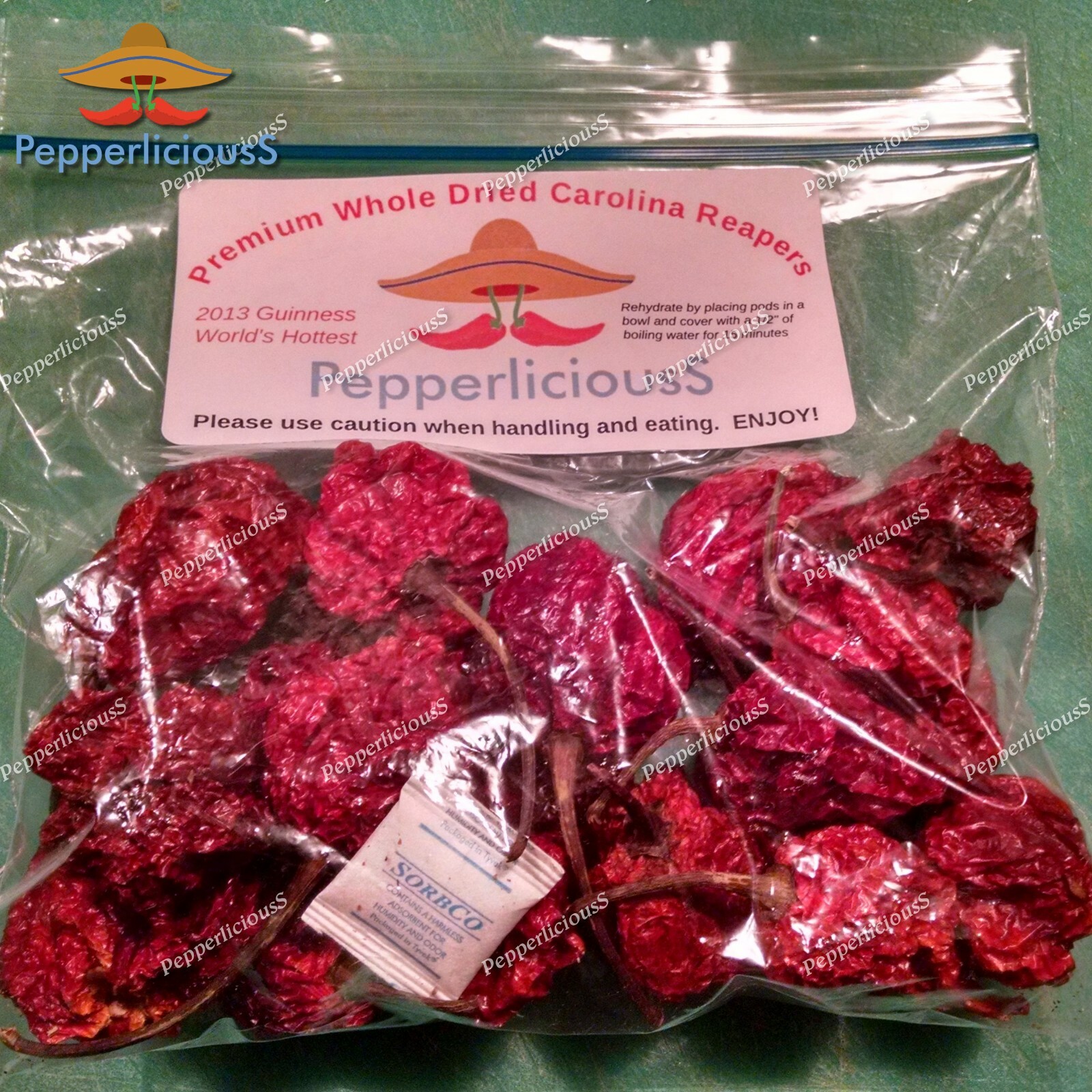 20 DRIED CAROLINA REAPER PEPPER PODS + 1/2 OZ REAPER OIL + 1/2 OZ REAPER FLAKES